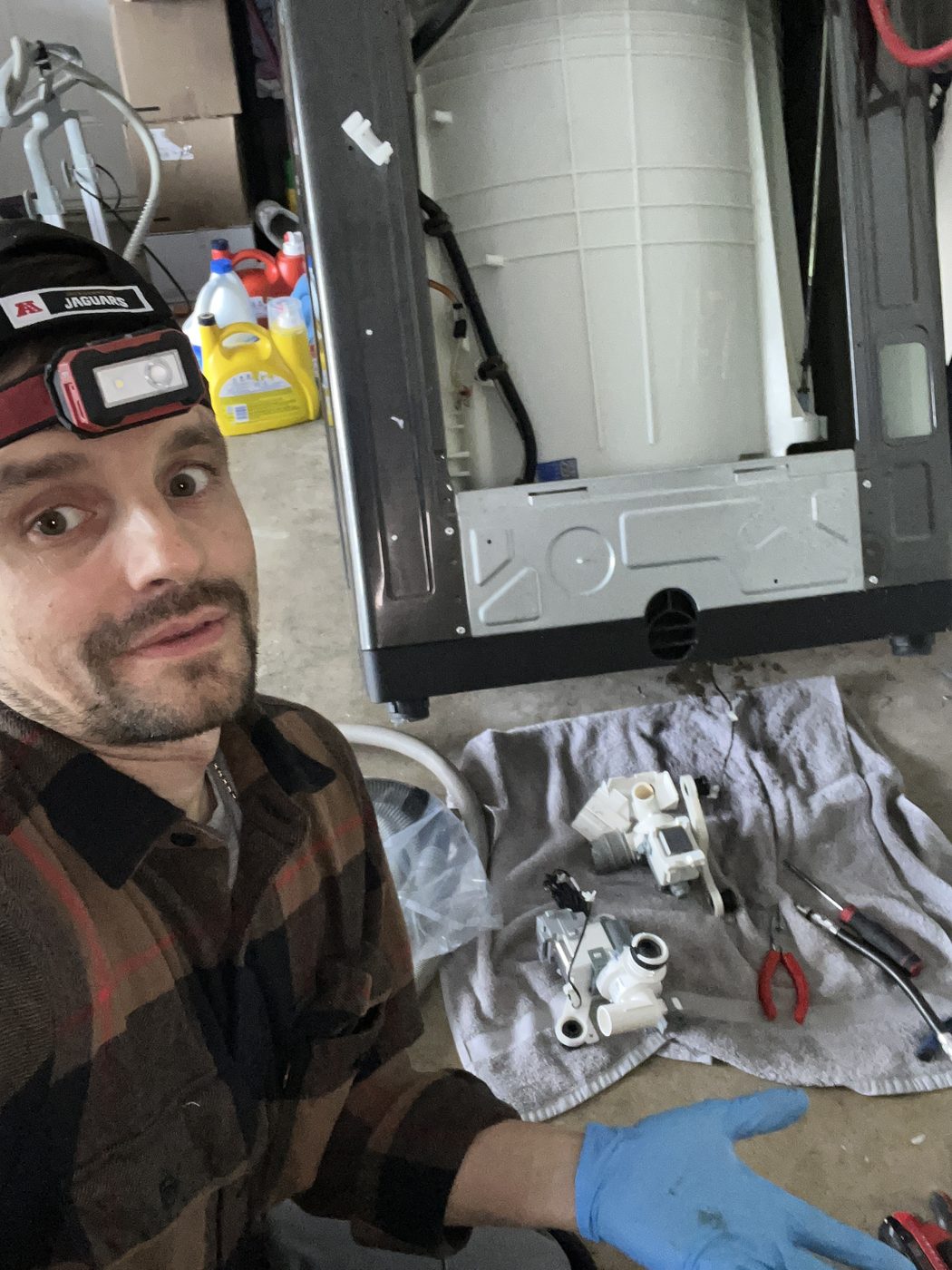 Konstantin with a dryer opened up for drum and valve replacement